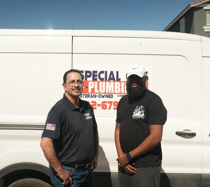 Adolfo and team in front of the van