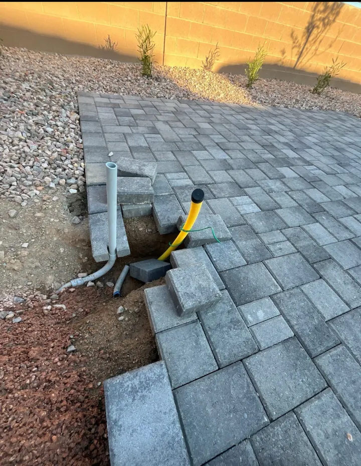 Yard line work through pavers
