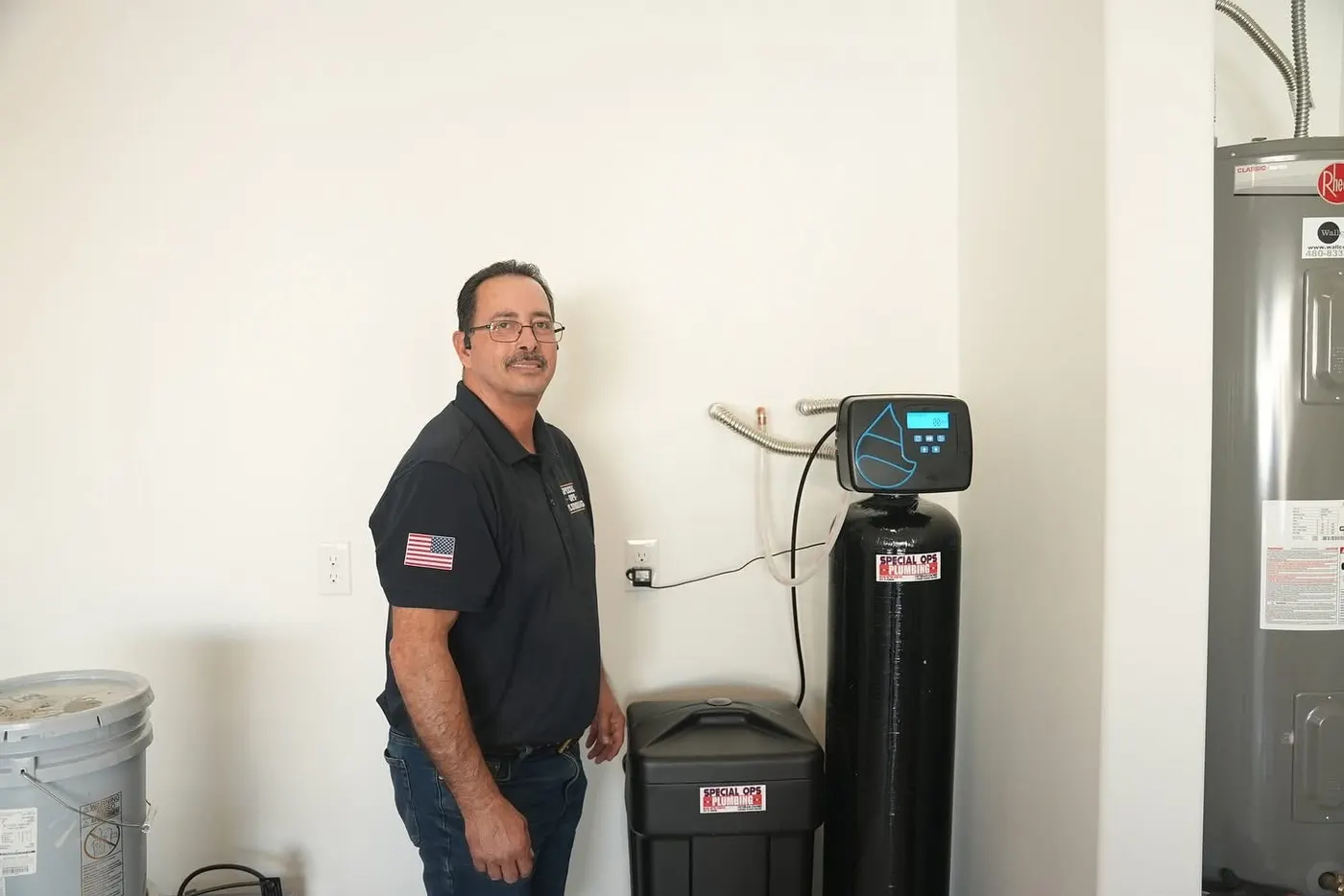 Adolfo installing a water softener on a Special OPS Plumbing AZ job